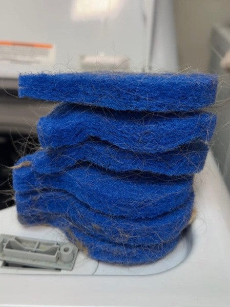 Customer using pet hair laundry catchers
